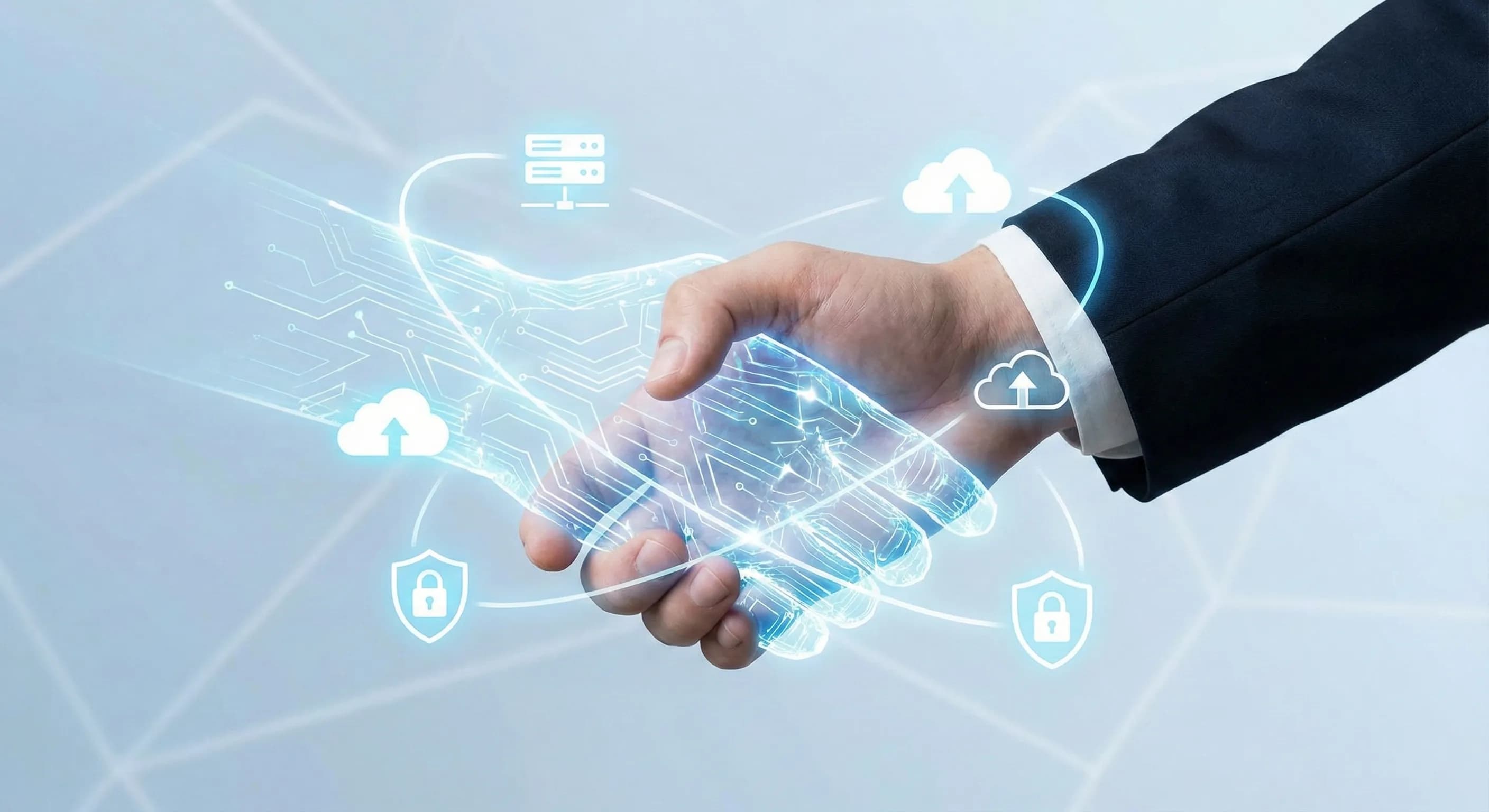 Two hands in a professional handshake, representing the partnership between businesses and managed IT service providers